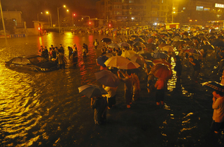 Illustration for article titled Beijing Flooding is Surreal and Awful